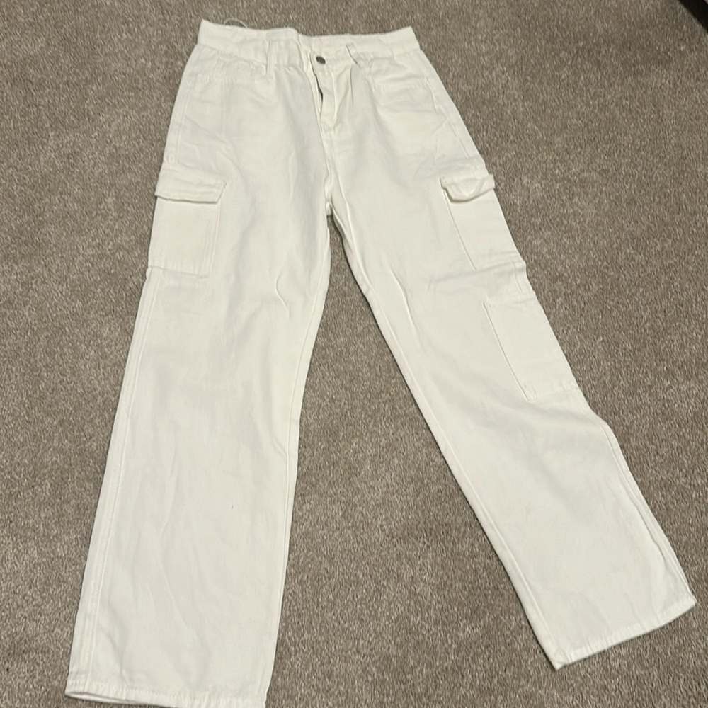 White jeans with cargo pockets.